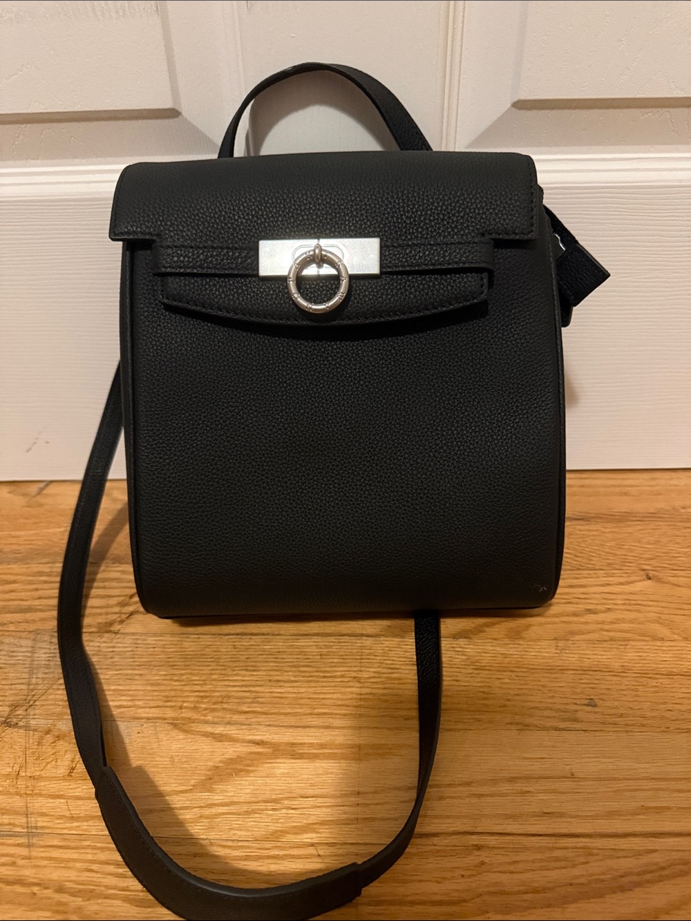 Black Structured Women’s Backpack with Silver Ring Accent